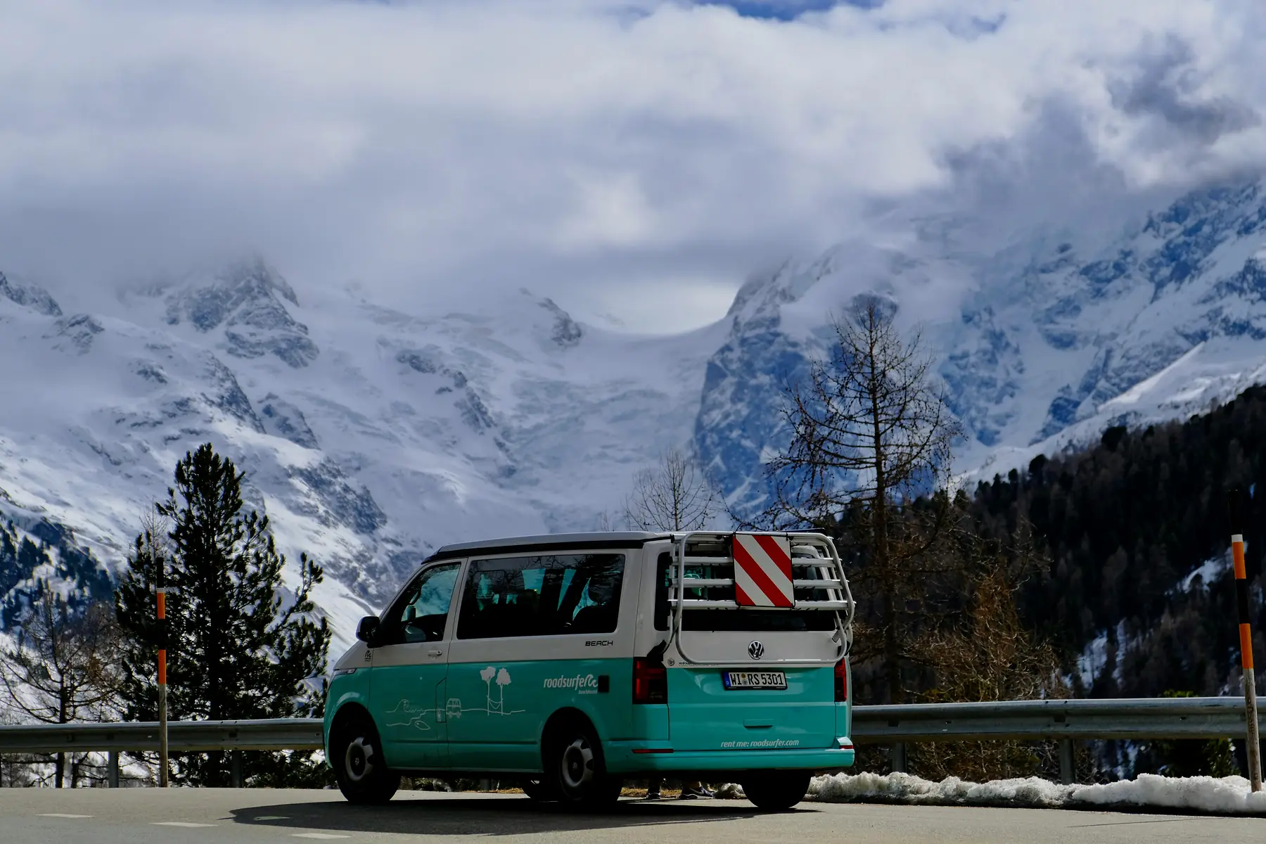 A 4x4 rental car stopped at a scenic overlook on Ruta 40 in Argentine Patagonia.