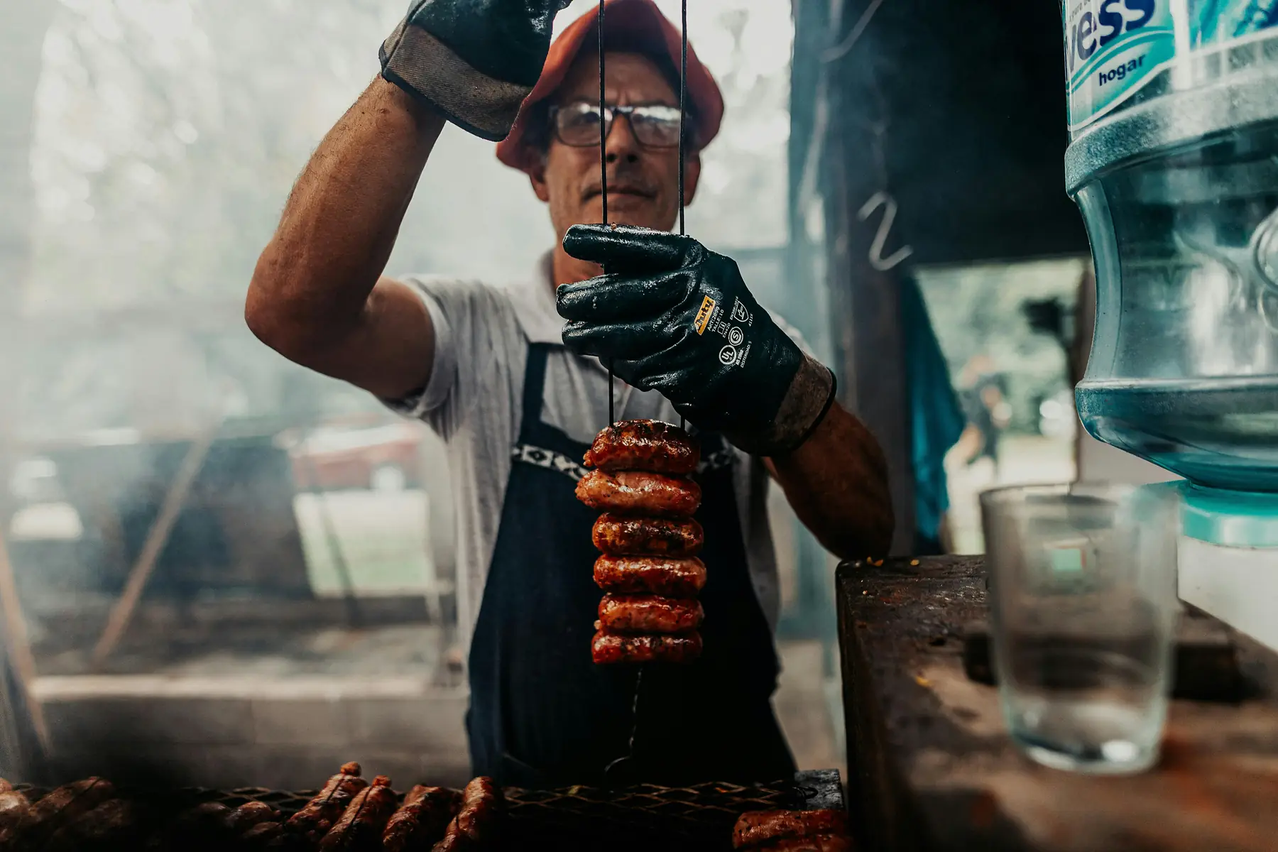 Lamb ribs and cuts of meat roasting slowly over Patagonian embers.