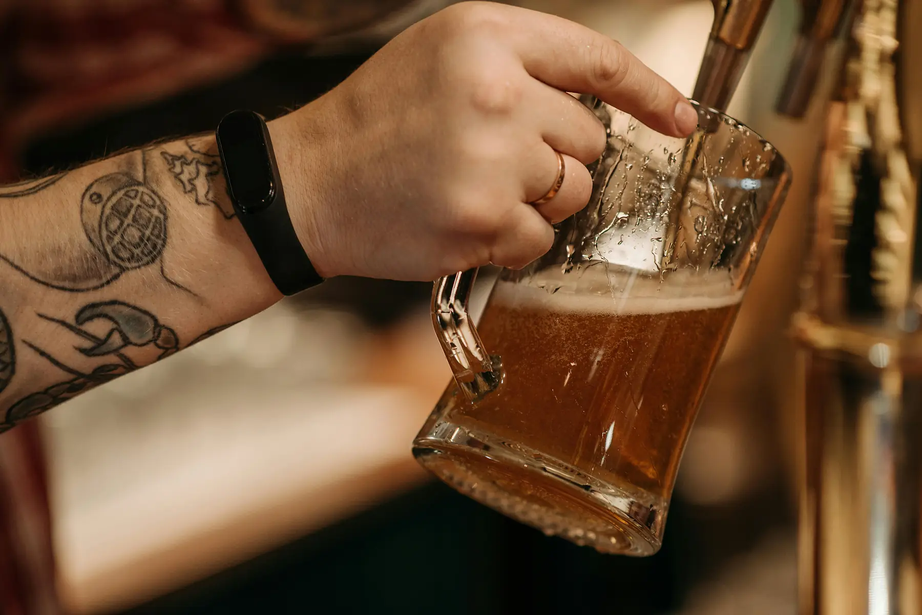 A pint of golden ale served alongside a Patagonian meal.