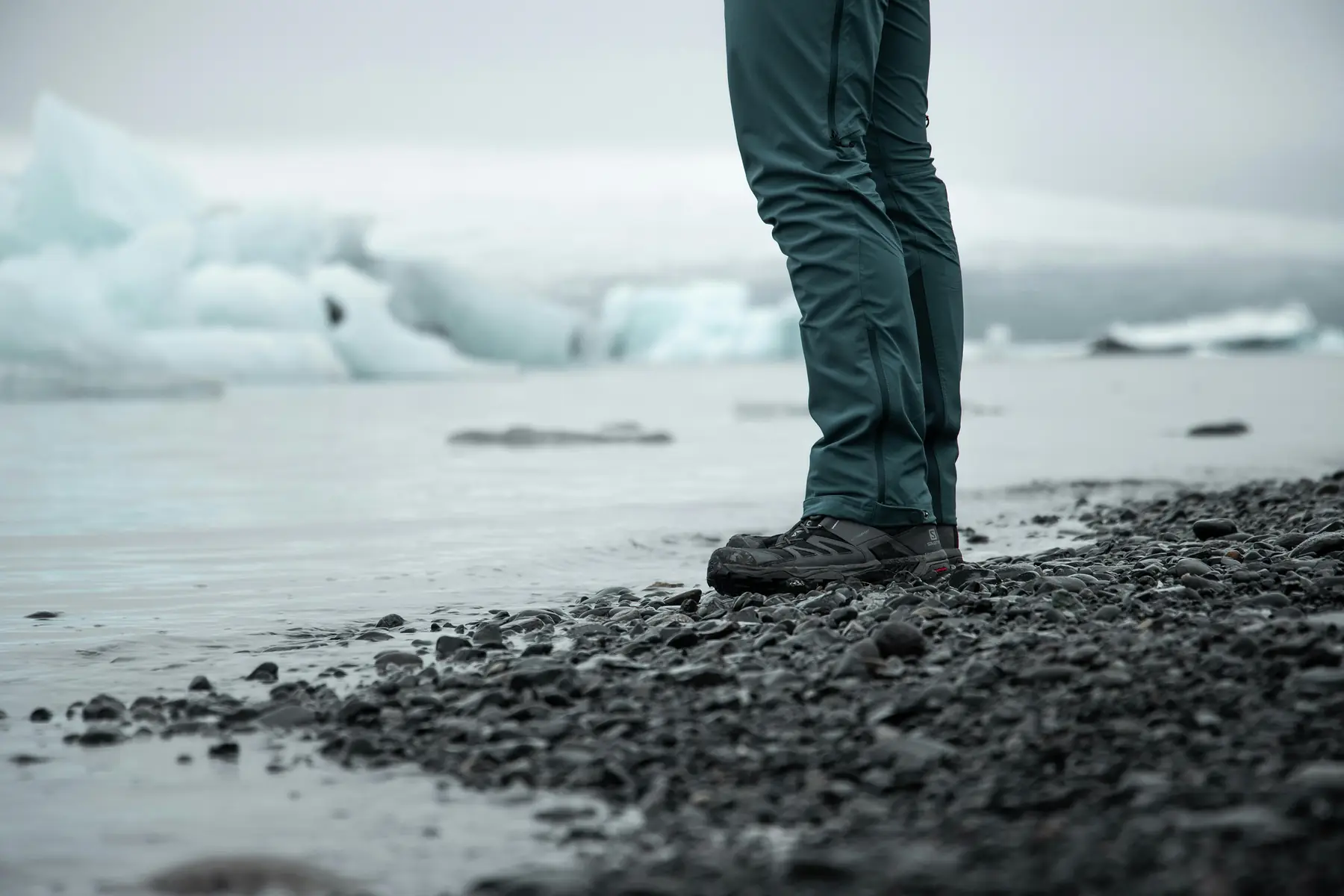 Softshell hiking pants on a trekker navigating rocky Patagonian terrain
