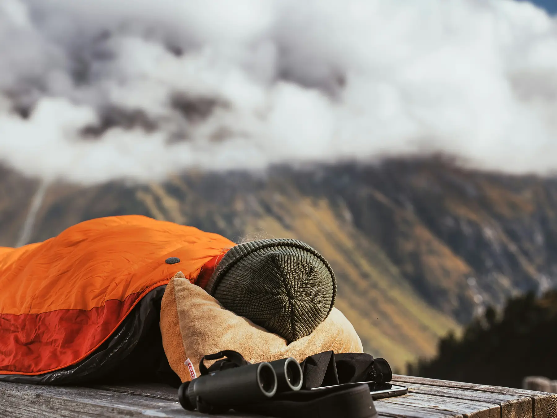 Close-up of sleeping bag insulation and draft collar detail for cold-weather camping.