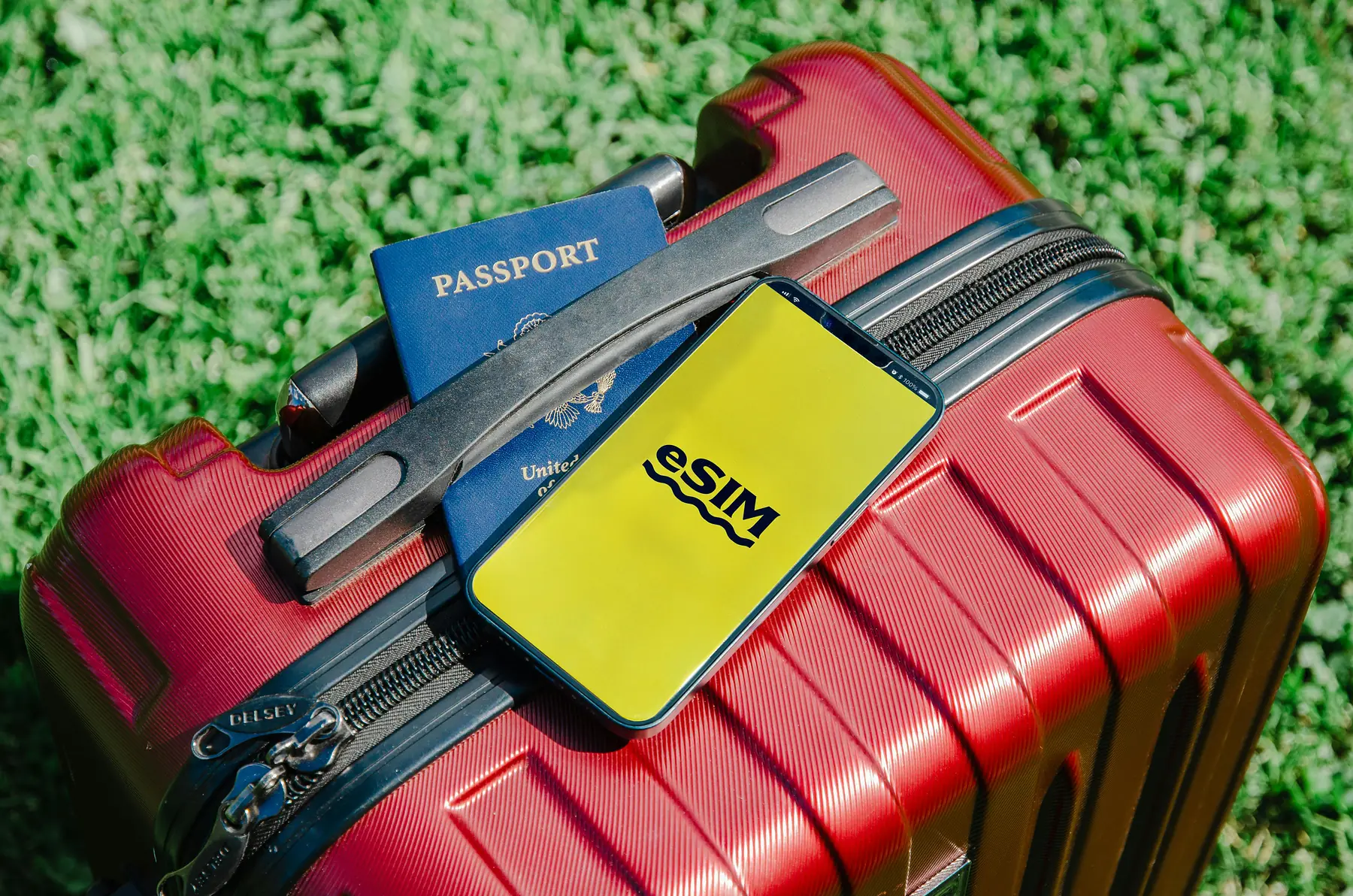 A local SIM card and mobile phone displayed beside a Patagonian map.