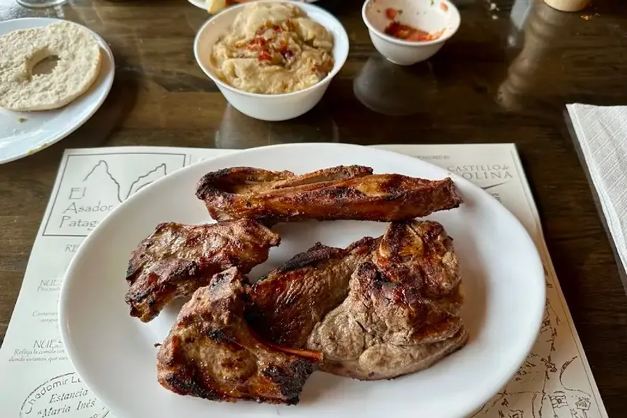 Patagonian lamb roasting over an open fire