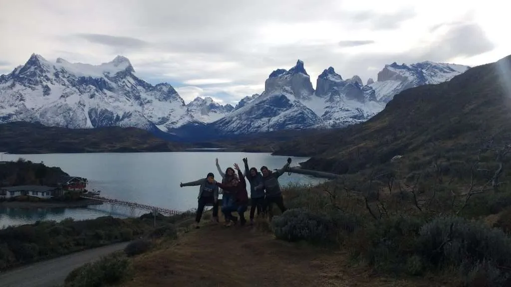 Travelers overlooking Torres del Paine on a panoramic day tour