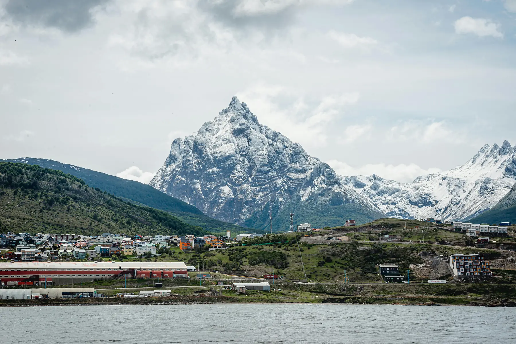 The port city of Ushuaia backed by jagged snow-capped peaks of the Darwin Range